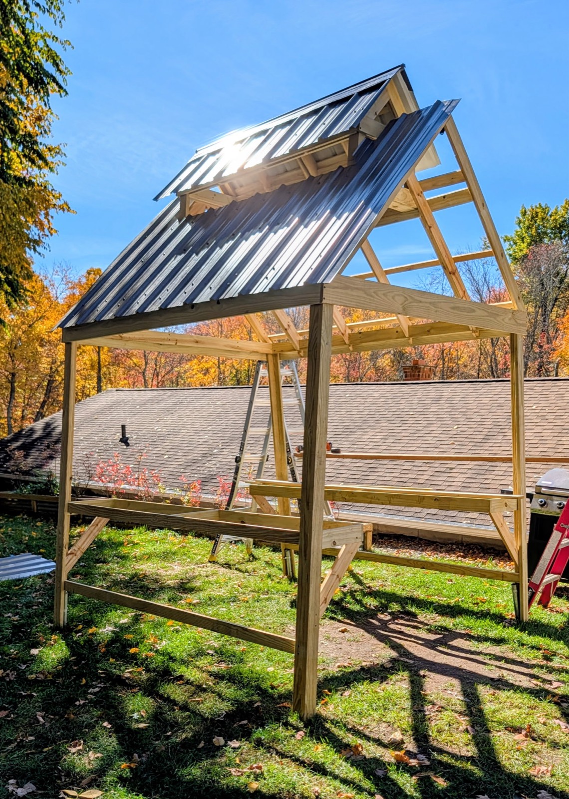 Timber-frame pavilion with metal roof